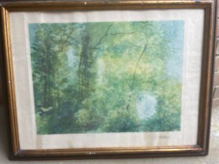 Quadro con cornice dorata