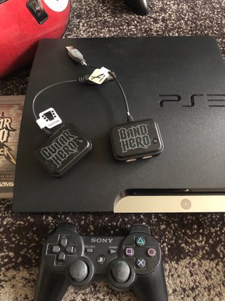 PS3 + Guitar Hero + Drums + Mando +micrófono