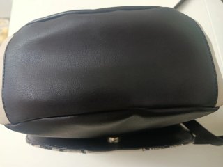 Bolso bandolera Tous piel serpiente y negro