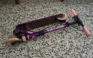 Patinete Oxelo Morado Ajustable y plegable.