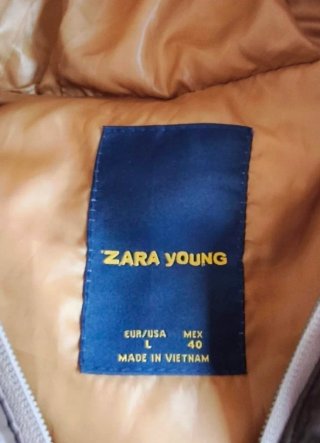 Chaleco acolchado Zara con capucha