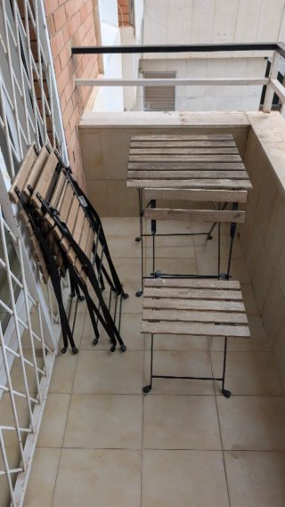 Mesa y sillas de jardín plegables