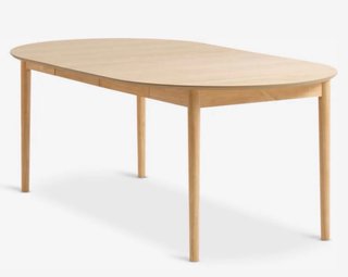 Mesa redonda de madera clara