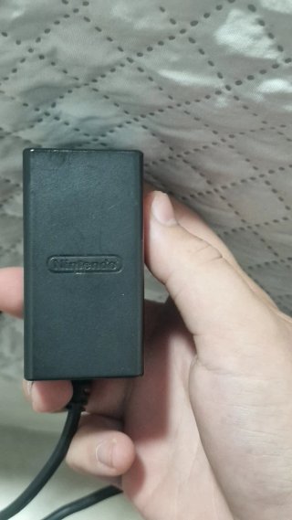Mando original  + adaptador y cargador original