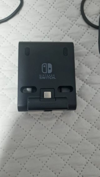 Mando original  + adaptador y cargador original