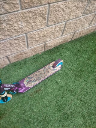 Patinete Oxelo Morado y Azul