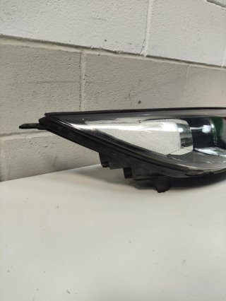 Faro delantero derecho. Kia Sportage de 2014.