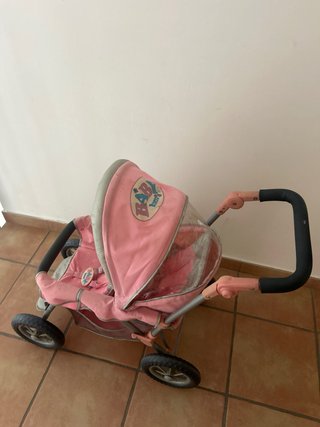 Cochecito de muñecas rosa