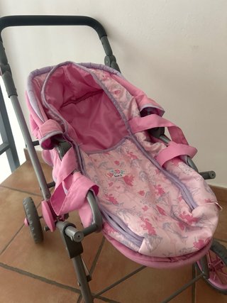Cochecito de muñecas rosa