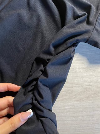 Maglia nera collo alto