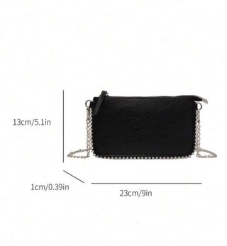 Bolso negro con cadena y tachuelas
