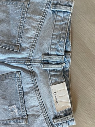 Shorts di jeans strappati blu