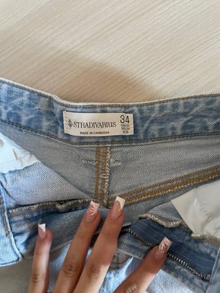 Shorts di jeans strappati blu