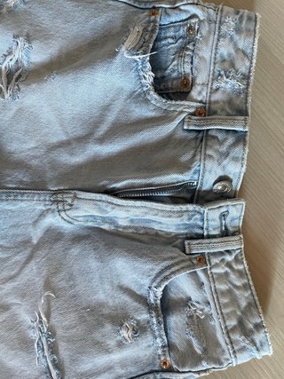 Shorts di jeans strappati blu
