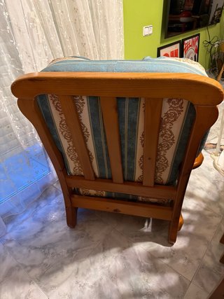 Butaca de madera con tapizado