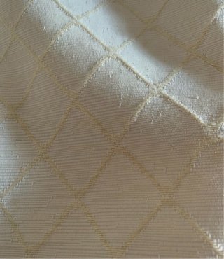 Funda cojín beige con pompones