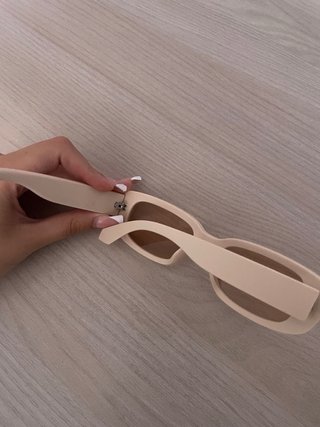 Occhiali da sole beige e marroni