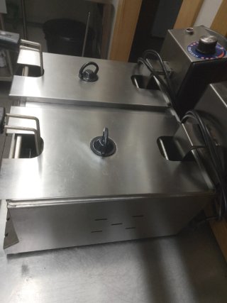 Plancha de cocina profesional con un fogón