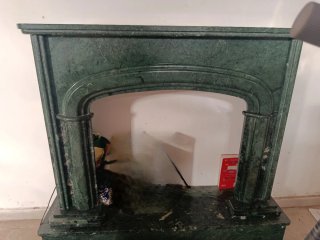 Frontal de chimenea de mármol verde