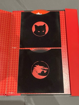 Amaral Gato Negro Dragon Rojo CD