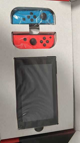 Nintendo Switch + 4 Juegos