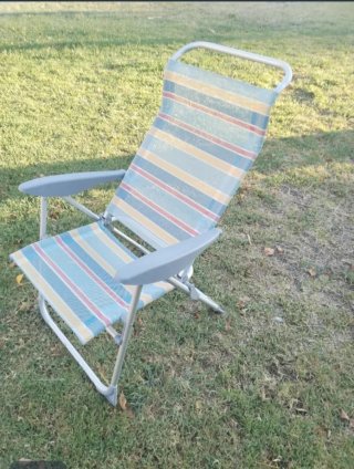 Silla de playa plegable como nueva.