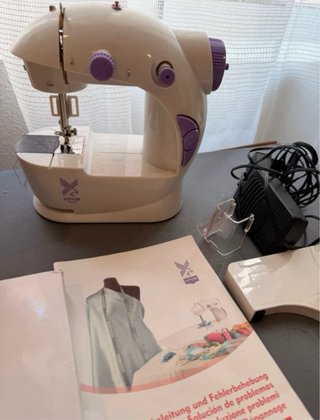 Máquina de coser casera + kit