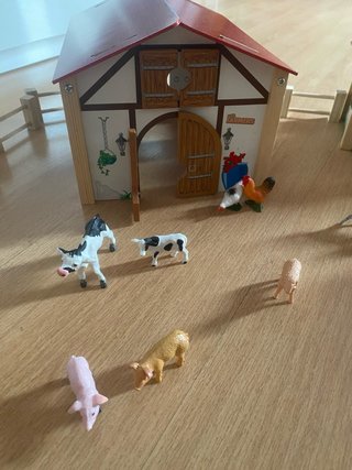 Granja de juguete con animales