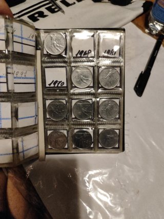Raccoglitore monete World Coin Stock