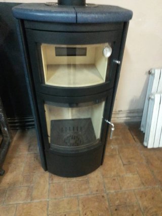 Estufa leña con horno para pizzas