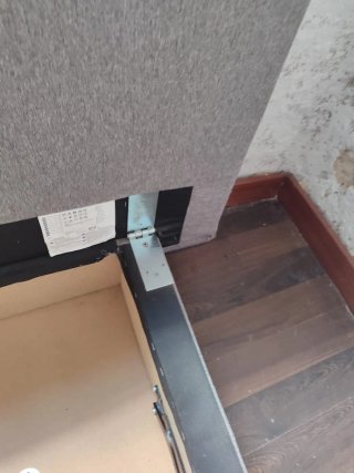 Sofá cama gris de tela