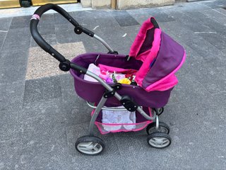 Carrito de muñecas morado y rosa