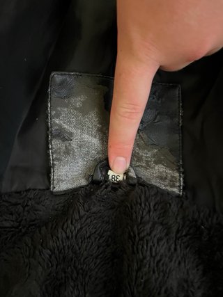 Chaleco de piel y pelo marrón