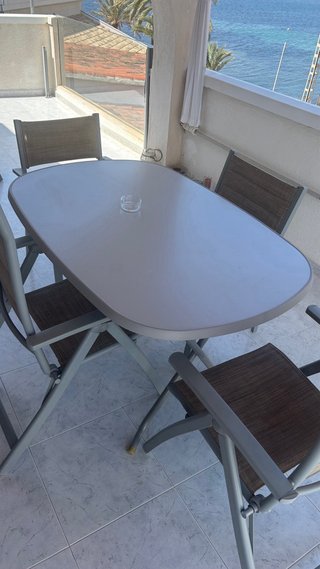 Mesa plegable y 4 sillas exterior