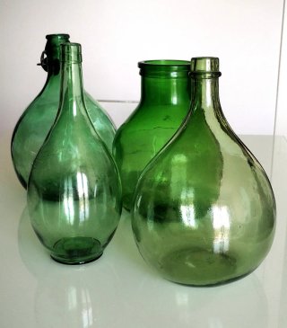 Bottiglie vintage verde anni '70