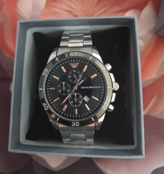 Reloj de metal Nuevo en Caja