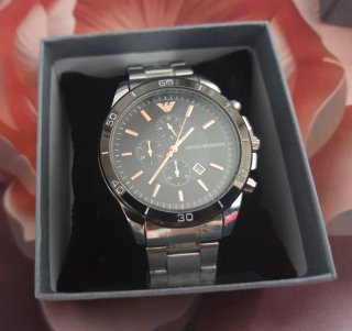 Reloj de metal Nuevo en Caja