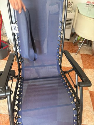 Silla reclinable azul y negra
