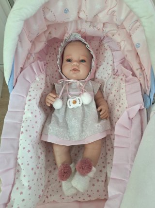 Carro de muñeca rosa con bebé