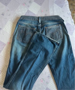 Jeans a zampa svasato da donna a vita bassa