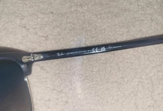 Gafas de sol Ray-Ban Clubmaster negras y plateadas