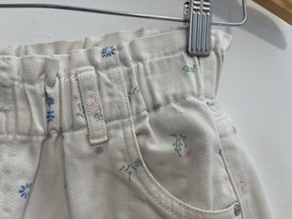 Pantalón corto blanco estampado floral