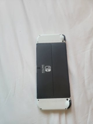 Nintendo switch OLED+Funda+Cargador+Plataforma