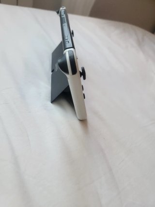 Nintendo switch OLED+Funda+Cargador+Plataforma