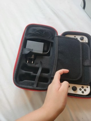 Nintendo switch OLED+Funda+Cargador+Plataforma