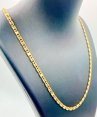 CADENA FÍGARO OJO DE ORO 18K. Peso 13.74g