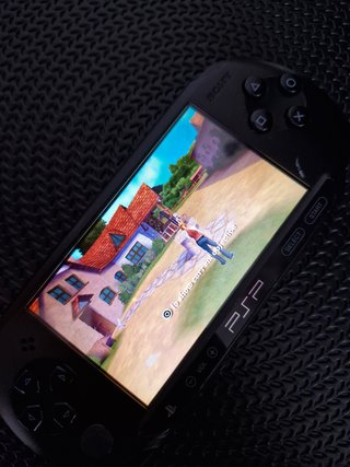 Sony PSP Street Negra + Cargador y 3 Juegos UMD