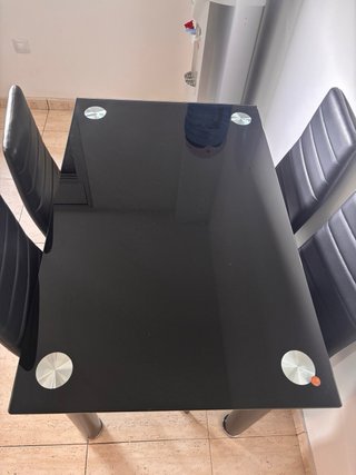 Mesa de comedor de cristal negra