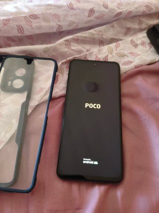 Poco x4 GT solo el móvil cargador y caja perdidas