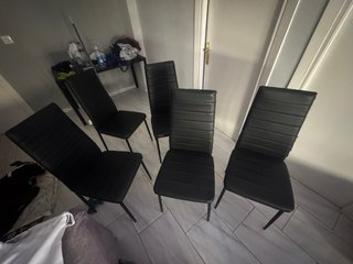 Juego de 4 sillas negras para salón